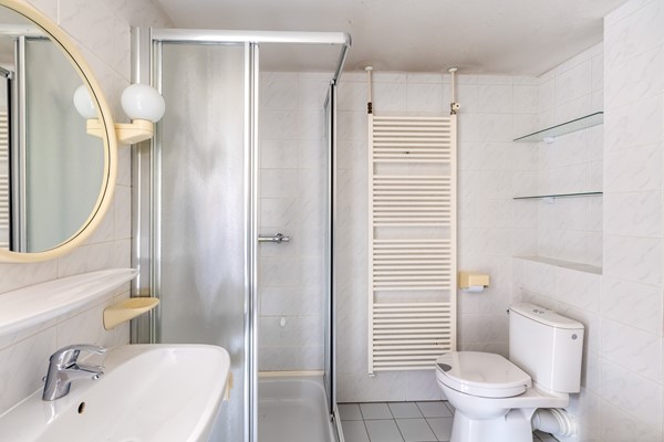 Foto - Te koop: tussenwoning gelegen aan groenvoorziening